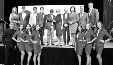  ??  ?? (Fifth left) Fernandes shakes hands with Australia’s Minister of Foreign Affairs Julie Bishop, while (from left) Australian news presenter Catriona Rowntree, Linfox Airports executive chairman David Fox, AirAsia X Malaysia CEO Benyamin Ismail,...