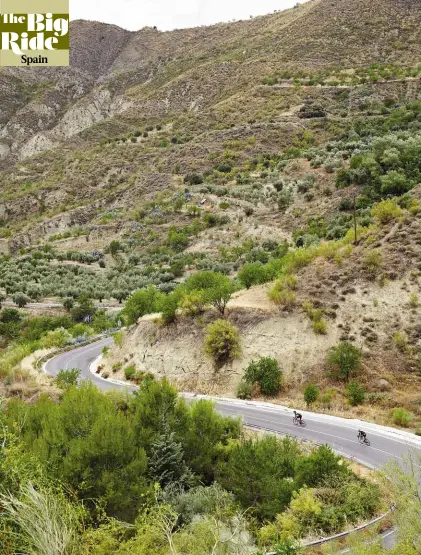  ??  ?? As the road levels out alongside the reservoir,
Cyclist enjoys a fast, rolling ride towards Cenes de la Vega, into warmer winds and thicker air