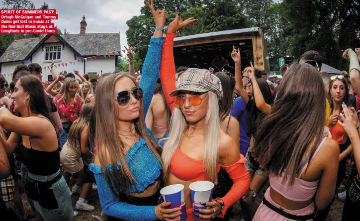  ??  ?? SPIRIT OF SUMMERS PAST: Orlagh McGuigan and Tammy Quinn get lost in music at the Red Bull Music stage at Longitude in pre-Covid times