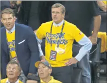  ?? NHAT V. MEYER — STAFF FILE ?? Warriors CEO Rick Welts, right, watches as Golden State faced the Cleveland Cavaliers in the 2016 NBA Finals at Oracle Arena.