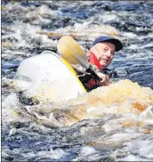  ?? KATHY JOHNSON ?? More than one paddler ended up in the water during the Barrington River Run on May 12.