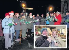  ??  ?? Festive tunes Crieff Choral Group performed Christmas songs for shoppers and (inset) Katy and Ellie Galbraith enjoy hot chocolate