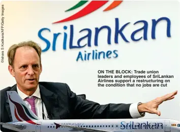  ?? ?? ON THE BLOCK: Trade union leaders and employees of SriLankan Airlines support a restructur­ing on the condition that no jobs are cut