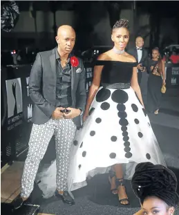  ?? Pictures: RAJESH JANTILAL ?? GRAND ENTRANCE: Nhlanhla Nciza and Theo Kgosinkwe of Mafikizolo won the best-styled group award at the Metro FM Music Awards