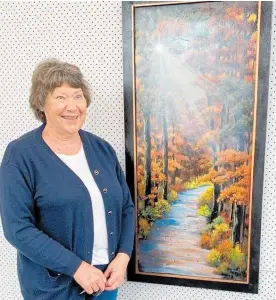  ??  ?? Val Helm with her winning Garden Mini Mural.