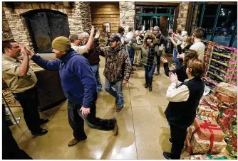  ?? TY GREENLEES / STAFF ?? Cabela’s was one of few retailers that had a sizable line of customers waiting for the store to open Black Friday. Local business owners hope for some traffic today on Small Business Saturday.