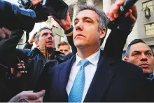  ?? AP ?? Michael Cohen walks out of federal court yesterday in New York after pleading guilty to lying to Congress about work he did on a project to build a Trump Tower in Russia.