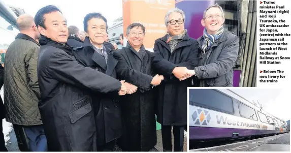  ??  ?? >
Trains minister Paul Maynard (right) and Koji Tsuruoka, the UK ambassador for Japan, (centre) with the Japanese rail partners at the launch of West Midlands Railway at Snow Hill Station >
Below: The new livery for the trains