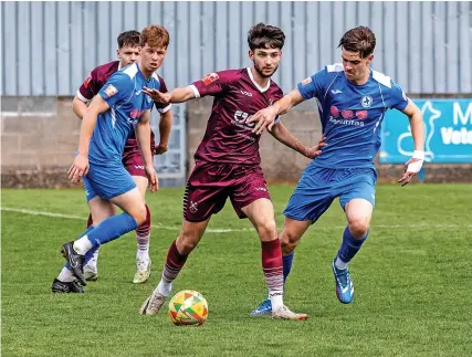  ?? Pics: Jenny Short ?? Above and below right, action from Paulton Rovers’ match against play-off hopefuls Larkhall Athletic at the weekend