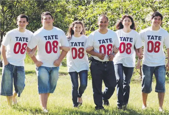  ??  ?? Gold Coast mayoralty aspirant Tom Tate with his family in 2008 (from left) David, Alex, Emily, wife Ruth and Chris.