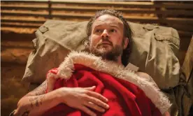  ?? Photograph: Ian Routledge/Stan ?? Daniel Henshall plays a shifty pseudo-Saint Nick in A Sunburnt Christmas.