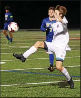  ?? RANDY MEYERS -- THE MORNING JOURNAL ?? Bay’s Nolan Sooy stops the ball near the sideline and in front of Ontario’s Andrew Male during the first half of a regional semifinal on Nov. 1.