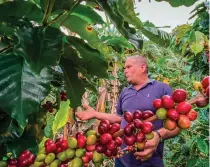  ?? AFP PHOTO ?? BETTING ON COFFEE
Coffee farmer Jesus Chaviano gestures during an interview with Agence France-Presse (AFP) at his coffee plantation in Jibacoa, Villa Clara province, Cuba, on Nov. 10, 2022. Cuba launched an official strategy to value the depressed coffee sector by cultivatin­g particular varieties of high quality and excellent grain yield, which would allow it to enter a select market for this product.