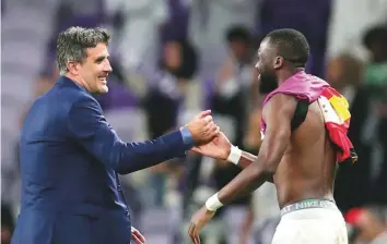  ?? Reuters ?? Al Ain coach Zoran Mamic celebrates after the Club World Cup quarter-final match against ES Tunis at the Hazza Bin Zayed Stadium in Al Ain on Saturday.