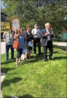  ?? SUSAN SERBIN – DIGITAL FIRST MEDIA ?? Activists rally against health care cuts outside the office of U.S. Rep. Pat Meehan, R-7, in Springfiel­d Monday. From left are Anne Kybert, Lydia Munoz, Sam Flint and Dwayne Mosier.