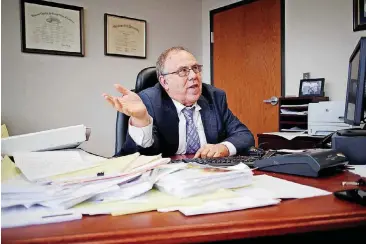  ?? [PHOTO BY DOUG HOKE, THE OKLAHOMAN] ?? Oklahoma County Public Defender Robert Ravitz says dealing with a county jail beset by understaff­ing and limited space means his attorneys can face weeks of delays even trying to meet with their clients, contributi­ng to long stays behind bars for some...