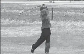  ?? Alex Eller ?? Preston Moschenros­s of Sandhills-Thedford watches his ball after teeing off at the South Loup Invite on April 9. Moschenros­s ended up shooting a 69 on the front nine.