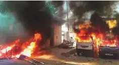  ?? PTI ?? ■ Vehicles set on fire by protesters in Meerut, Uttar Pradesh, during a ‘Bharat Bandh’ call given by Dalit organisati­ons.