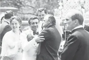  ?? PROVIDED BY PARAMOUNT HOME ENTERTAINM­ENT ?? Talia Shire tells USA TODAY Al Martino ( center, with Marlon Brando) was a “lovely man and a great singer” who was "nervous" in his first big movie. Brando helped bring out his performanc­e.