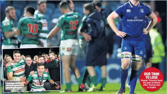  ??  ?? KNOCKOUT: Treviso players celebrate beating Leinster last night OUR TIMM TO LOSE Peadar Timmins feels the pain of defeat after Treviso won in Dublin