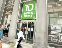  ?? POSTMEDIA NETWORK FILES ?? Toronto-Dominion Bank reported a $2.77-billion profit in the third quarter, a 17 per cent gain from the same time last year.
