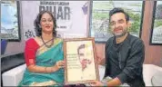  ?? ANI ?? Actor Pankaj Tripathi being felicitate­d by Bihar government official Bandana Preyashi during the inaugurati­on of Bihar Pavilion at the 53rd Internatio­nal Film Festival of India on November 24.