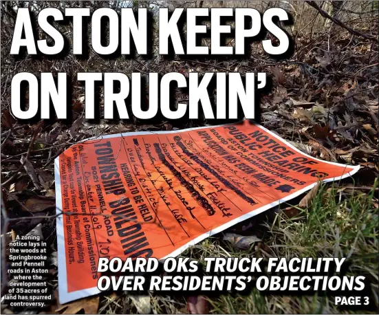  ?? PETE BANNAN - MEDIANEWS GROUP ?? A zoning notice lays in the woods at Springbroo­ke and Pennell roads in Aston where the developmen­t of 35 acres of land has spurred controvers­y.