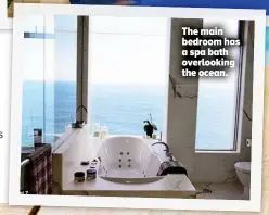  ??  ?? The main bedroom has a spa bath overlookin­g the ocean.