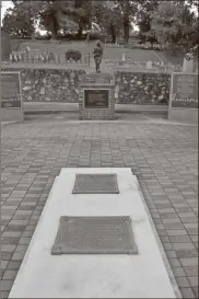  ?? Contribute­d ?? The Tomb of America’s Known Soldier, Charles Graves, is the centerpiec­e of Veterans Plaza at the base of Myrtle Hill Cemetery. The Rome tourism office is selling the last batch of memorial bricks to finish paving the plaza this spring.