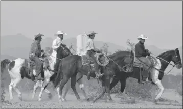  ?? FILE PHOTO ?? A GROUP OF RIDERS TAKES PART IN THE CABALGATA CONTRA EL CANCER, an annual horseback ride that benefits families with loved ones battling cancer. The ride takes place Saturday.