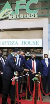  ??  ?? President Emmerson Mnangagwa cutting the ribbon at the official launch of AFC.