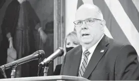  ?? PAMELA WOOD/BALTIMORE SUN ?? Maryland Gov. Larry Hogan speaks at the State House in Annapolis on Thursday. He has earmarked $100 million specifical­ly to aid small businesses.