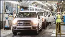  ?? (TNS) ?? Ford F-150 trucks come off the assembly line at the Ford Rouge Plant in Dearborn. (File photo)