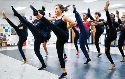  ?? CONTRIBUTE­D BY ELIJAH NOUVELAGE ?? High school students practice a dance routine during an after-school dance class last month at Babb Middle School in Forest Park. They are learning much more than just how to dance.