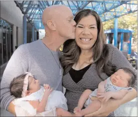  ?? ADRIAN LAM/Victoria Times Colonist ?? Ian and Margo Sheldon with their two babies, Sofia Grace and Austin Olivier. Sofia is four days older and was carried by a surrogate. Austin was conceived naturally.They have been discharged from Victoria General Hospital and will be heading home to Jasper in the next few weeks.