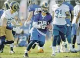  ?? Gary Coronado ?? TODD GURLEY goes through drills during the Rams’ first day of training camp at UC Irvine.