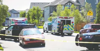  ?? AL CHAREST FILES ?? Calgary Police investigat­e after a fatal shooting in the community of Legacy on July 14.