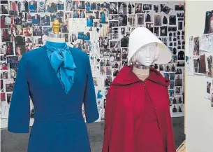  ?? BROOKE PALMER/COURTESY OF MGM TELEVISION ?? Examples of costumes for Serena Joy (Yvonne Strahovski) and Offred (Elisabeth Moss) in front of a board full of photos that have inspired Handmaid's Tale costume designer Ane Crabtree.