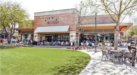  ?? Photos by Sabrina Miskelly / Dish Society ?? Dish Society’s new space at LaCenterra at Cinco Ranch in Katy has patio seating for 80.