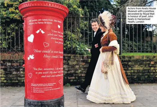  ??  ?? Actors from Keats House Museum with a postbox decorated by Royal Mail in honour of poet John Keats in Hampstead Heath, London