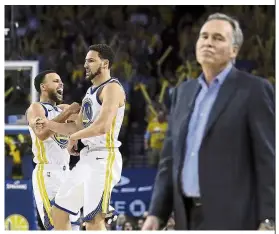  ?? — AP ?? Happy and sad: Golden State Warriors’ Stephen Curry (left) and Klay Thompson celebratin­g as Houston Rockets coach Mike D’Antoni (right) walks onto the court during the second-round NBA playoff series match on Wednesday.