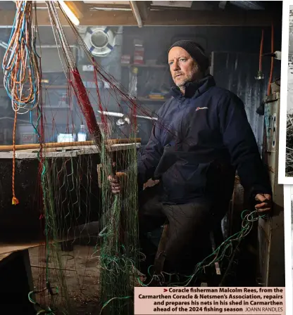  ?? JOANN RANDLES ?? > Coracle fisherman Malcolm Rees, from the Carmarthen Coracle & Netsmen’s Associatio­n, repairs and prepares his nets in his shed in Carmarthen ahead of the 2024 fishing season nd