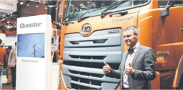  ??  ?? Van den Heede is all thumbs-up for the Quester model on display at the UD Trucks booth in Tokyo Motor Show 2017.