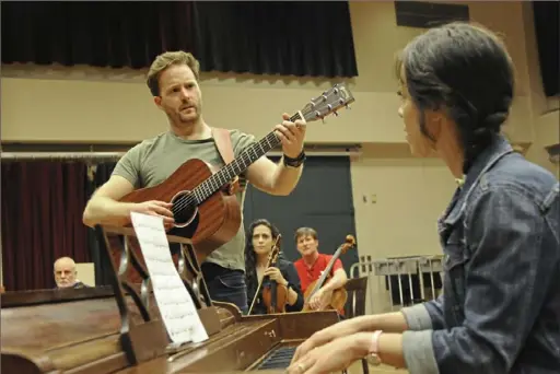  ?? Lake Fong/ Post- Gazette photos ?? Stuart Ward, left, and Esther Stilwell rehearse the award- winning song “Falling Slowly” for the Pittsburgh CLO production of the Tony- winning musical “Once,” coming to the Benedum Center, Downtown, Tuesday through Sunday.