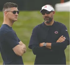 ?? THE ASSOCIATED PRESS/FILES ?? Bears general manager Ryan Pace, left, and head coach Matt Nagy have managed to keep their jobs despite the fact Chicago hasn't won a single playoff game under their combined leadership.