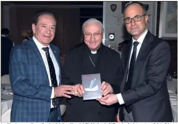  ?? (Photo Géraldine Massoni) ?? Les Monégasque­s Roger Rossi et Stéphan Maggi, à l’initiative du DVD et du site internet sur Sainte Dévote, aux côtés de Monseigneu­r Luigi Pezzuto, nonce apostoliqu­e.