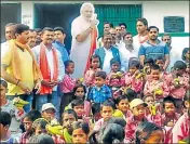  ?? HT ?? BJP leaders celebrate PM Narendra Modi’s birthday, a day in advance, at a government school in Varanasi on Saturday.