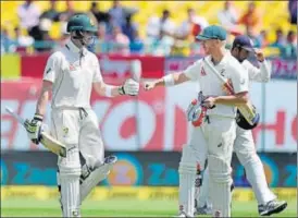 ?? PTI ?? After Steve Smith (left) struck his third century of the series on Saturday, wicketkeep­er Matthew Wade called the said the skipper was on his way to becoming one of the best Australia have produced.