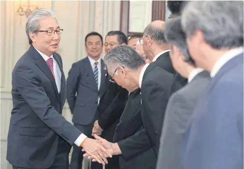  ??  ?? SME executives from Mie prefecture in Japan meet Deputy Prime Minister Somkid Jatusripit­ak.