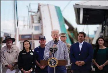  ?? (File Photo/AP/Evan Vucci) ?? Biden addresses a crowd Oct. 5 after touring an area impacted by Hurricane Ian in Fort Myers Beach, Fla.